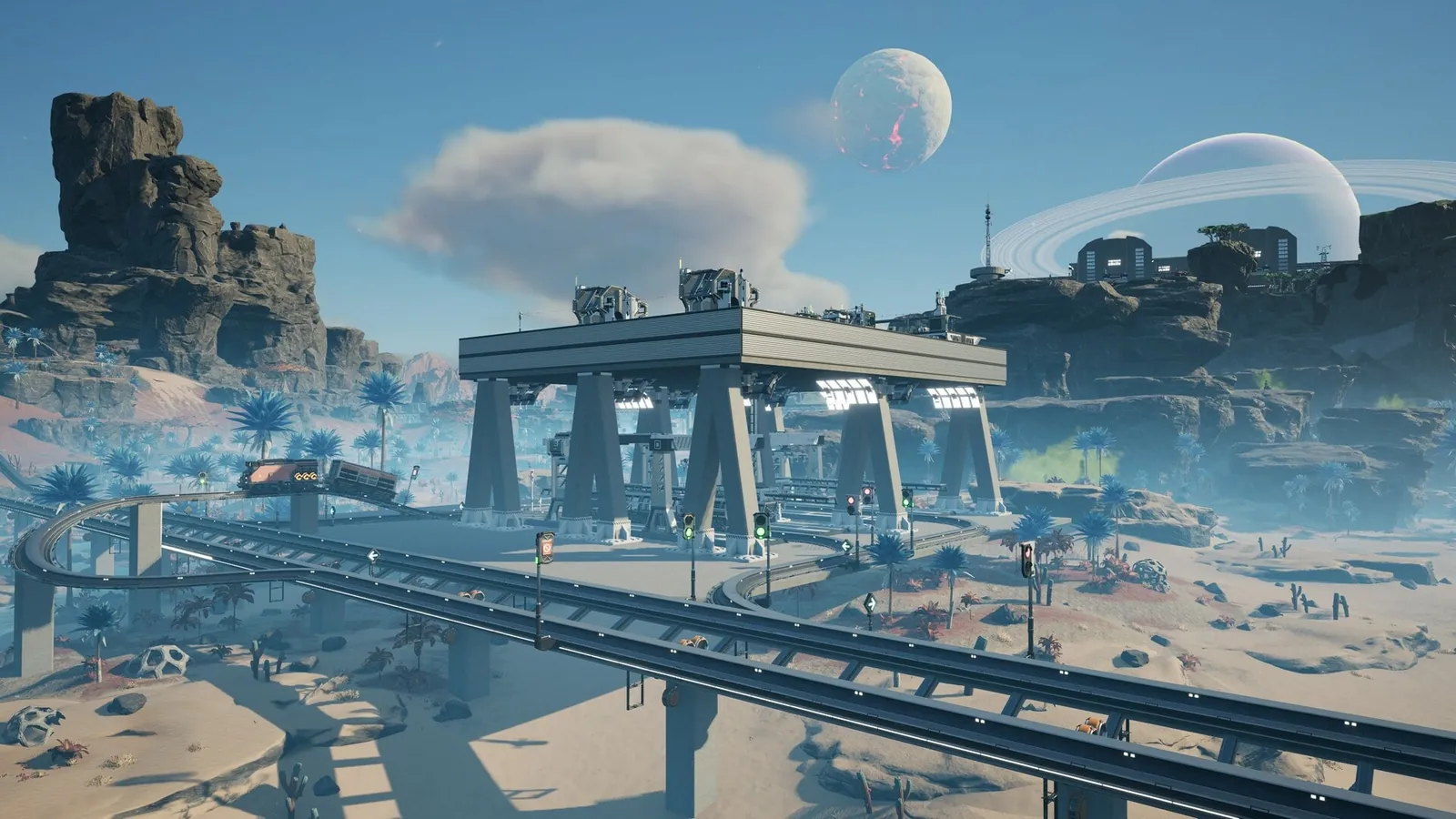A Satisfactory rail junction on a pale desert plain: elevated tracks, signals and a freight train under a ringed planet and a red moon.